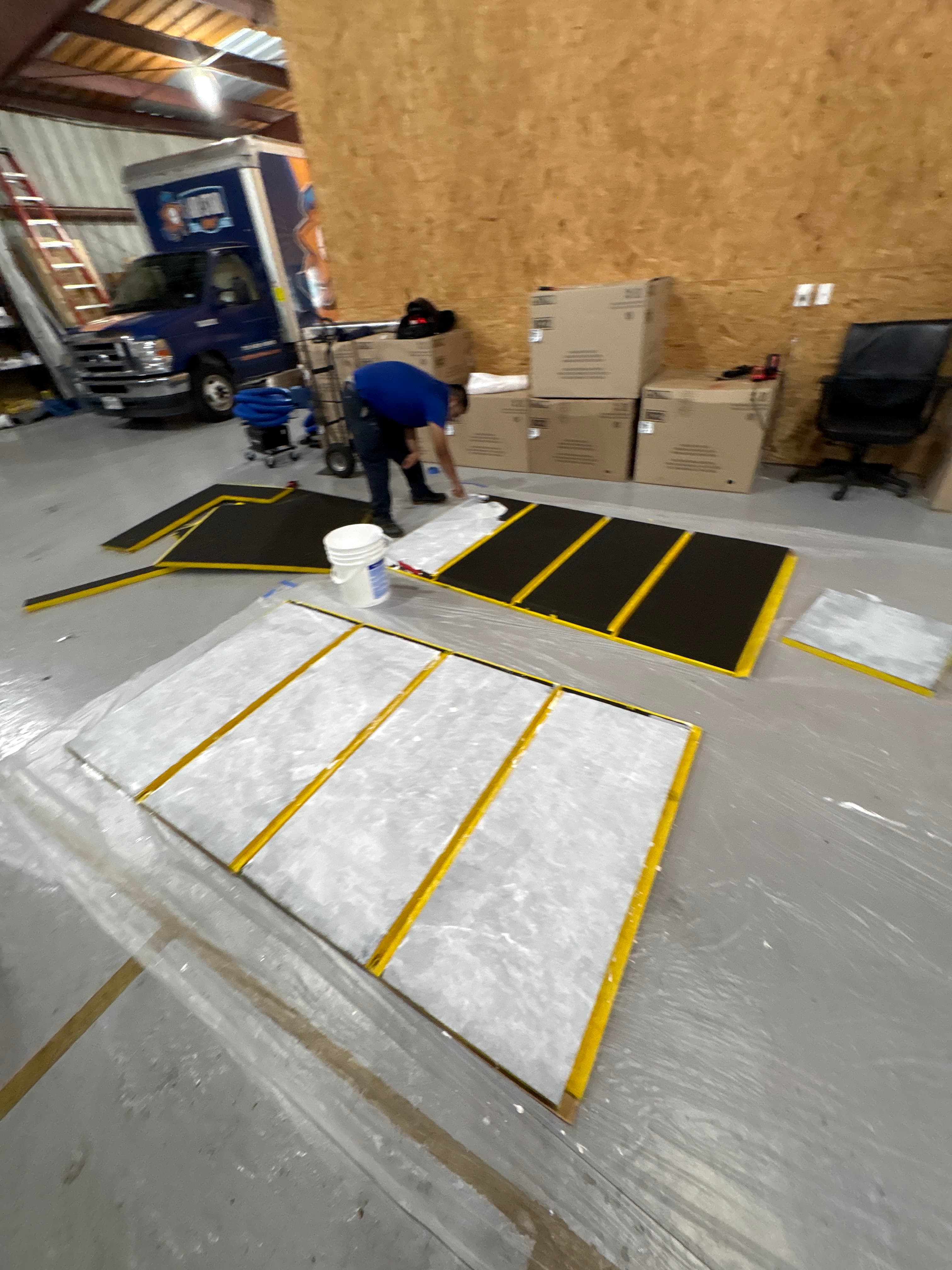 An Air Star Now technician prepping equipment in the shop before a job